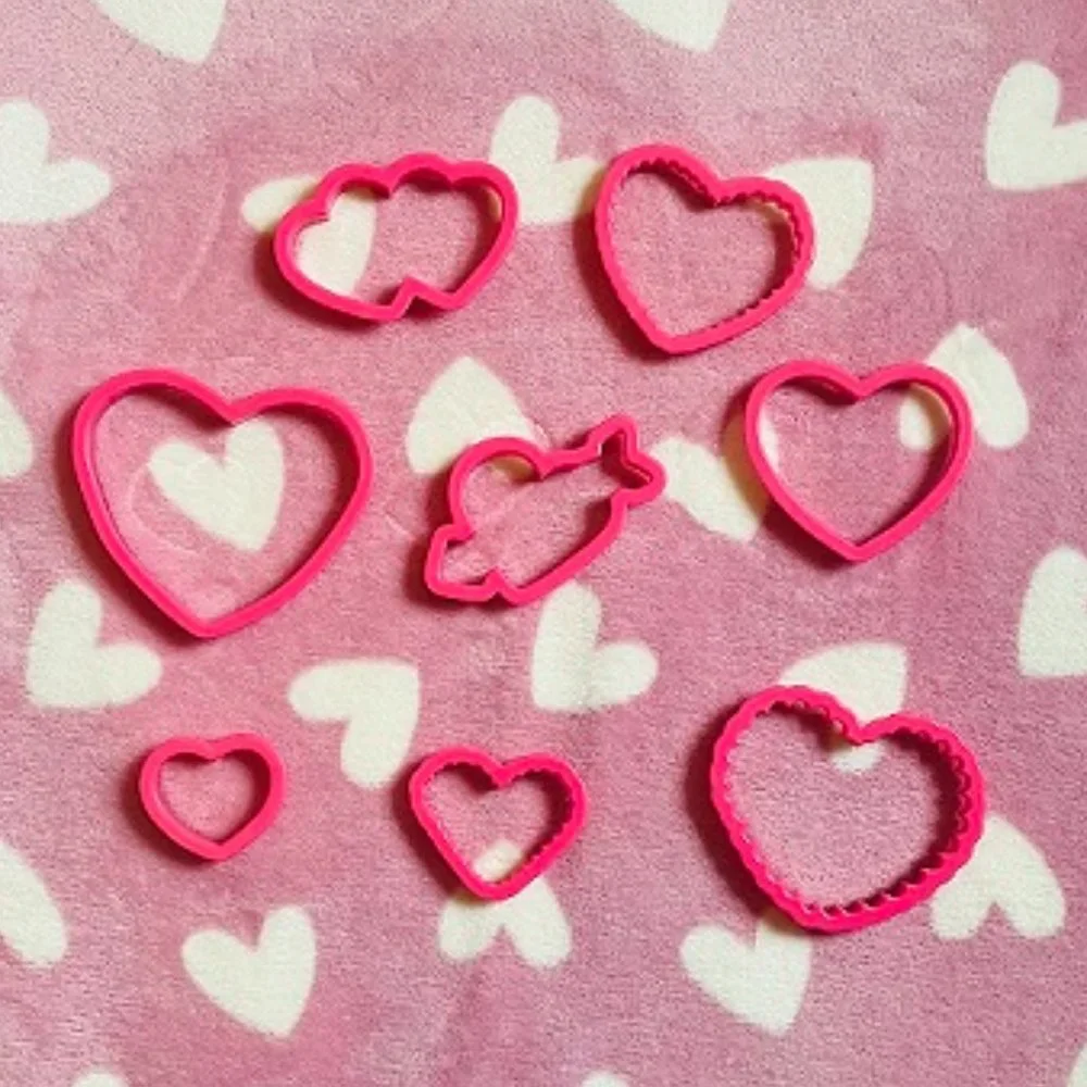 never used 83-piece cookie cutter set from Wilton - Picture 2 of 10